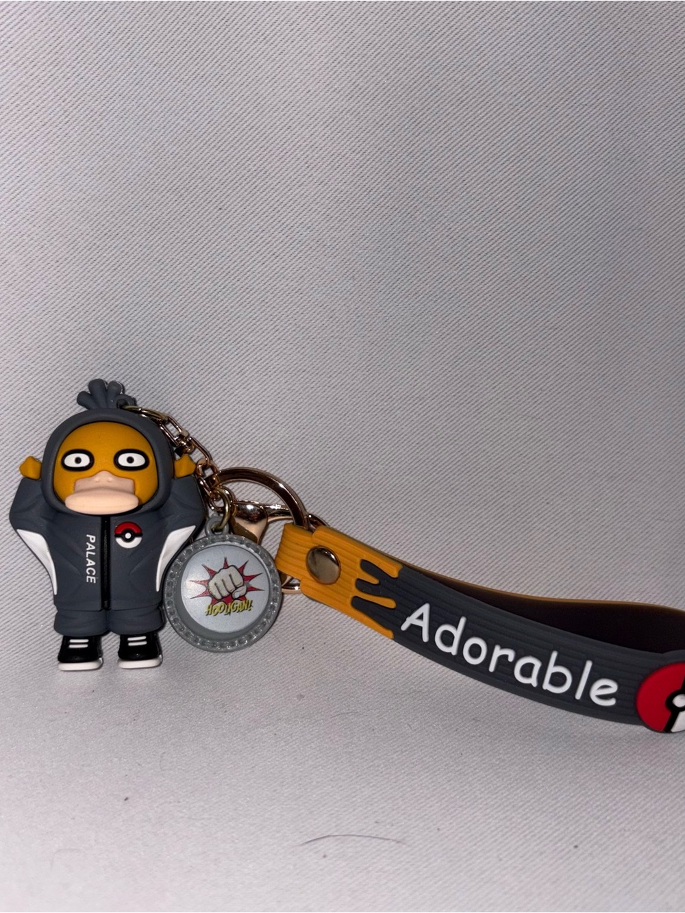 Adorable Yellow Psyduck Keychain with Gray Strap